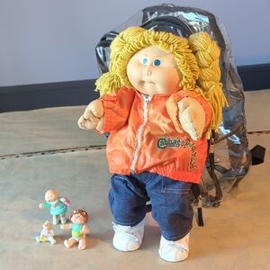 Cabbage Patch Kids Doll with Vibrant Orange Jacket and Denim Pants